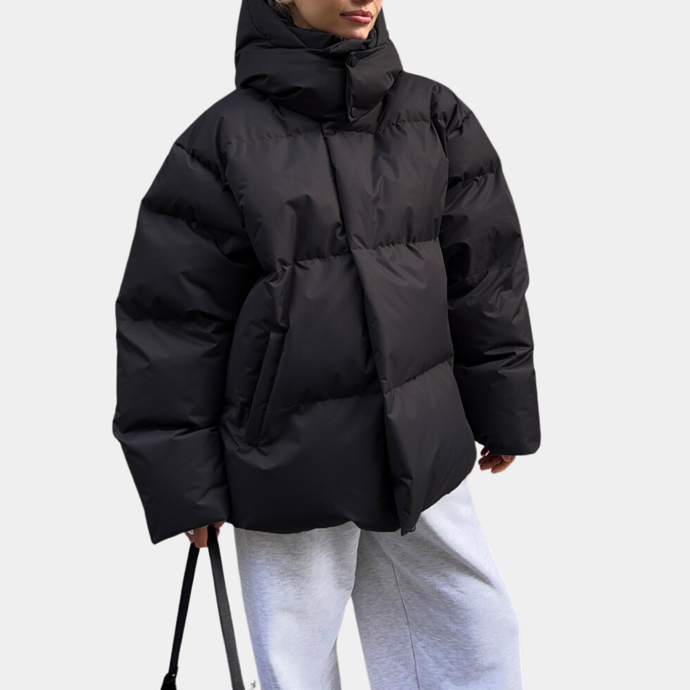 Women's oversized quilted puffer jacket with hooded collar and zip front
