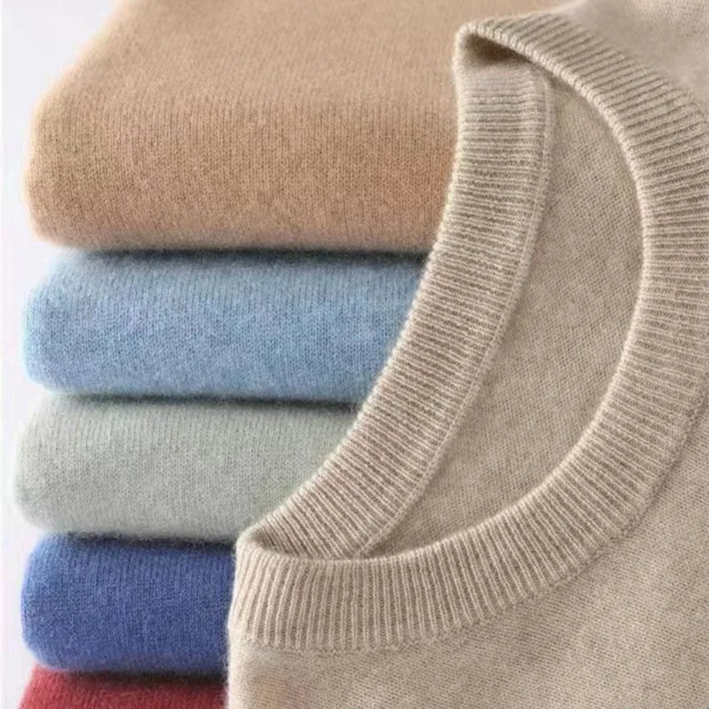 Men's solid crew neck knit pullover sweater with long sleeves and ribbed cuffs