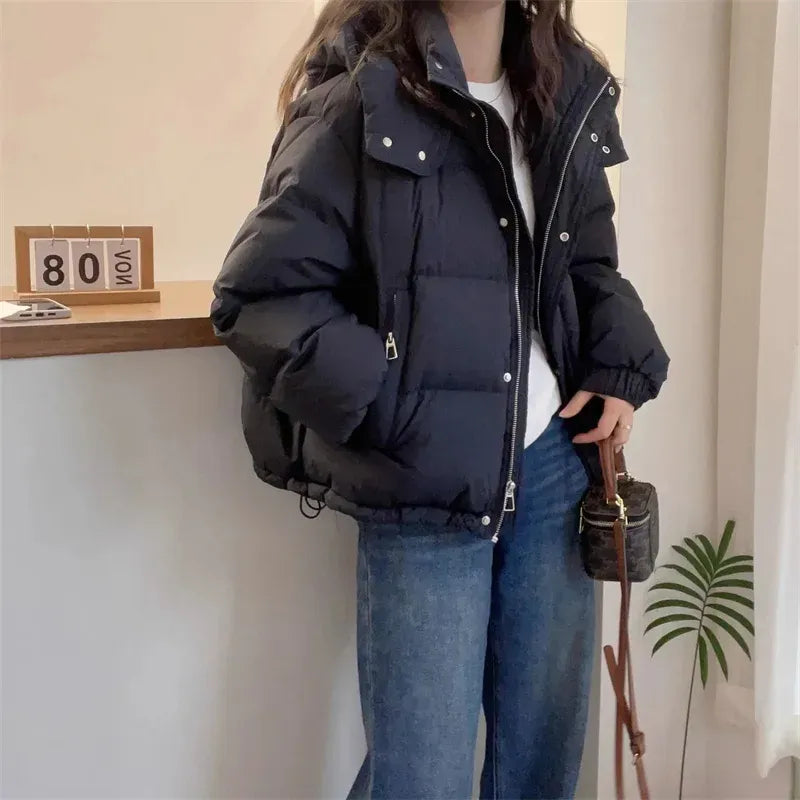 Women's cropped quilted puffer jacket with hood, long sleeves and zip front