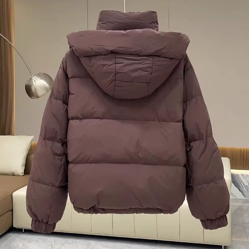 Women's cropped quilted puffer jacket with hood, long sleeves and zip front