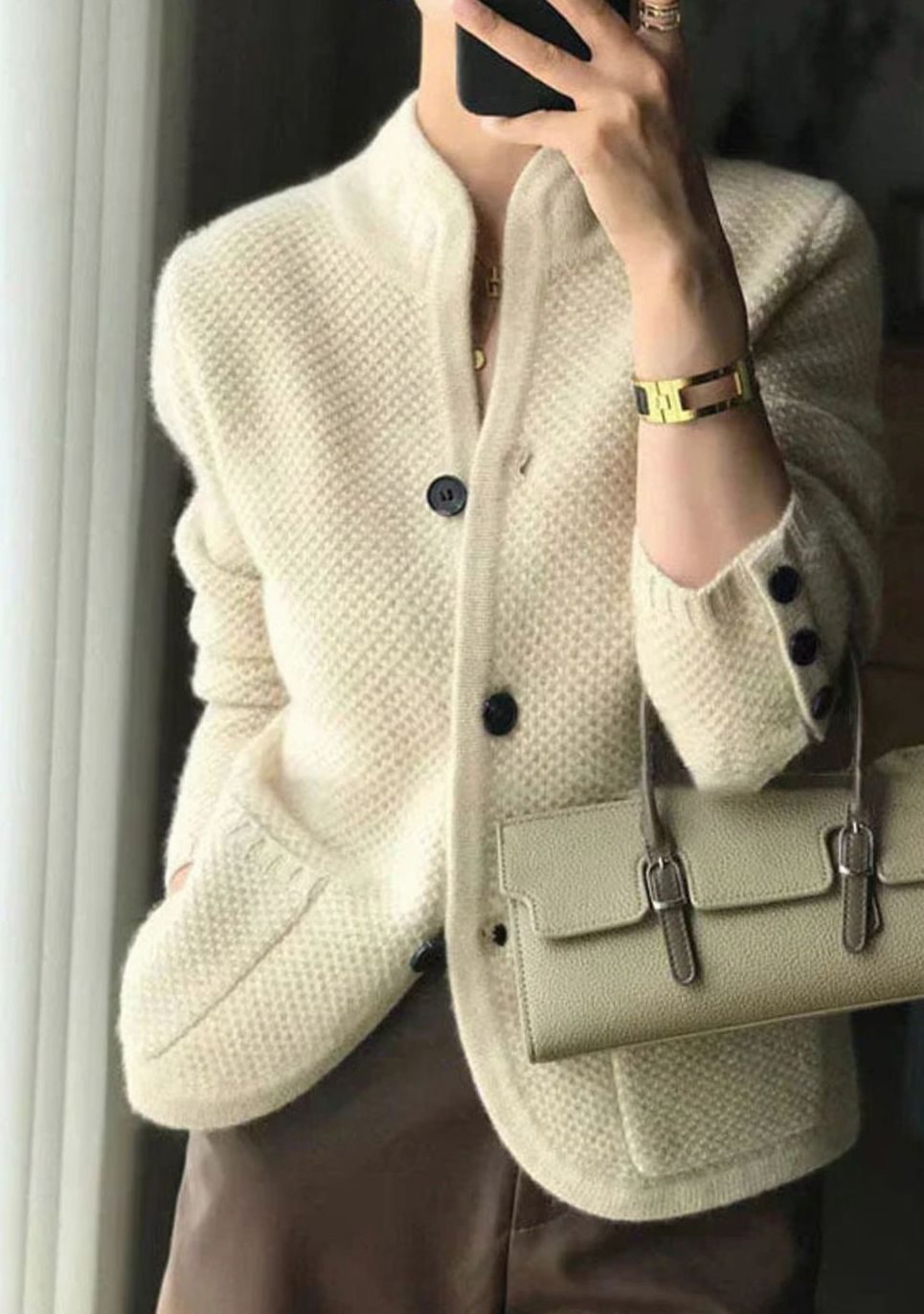 Women's ribbed knit cardigan with stand collar and button front