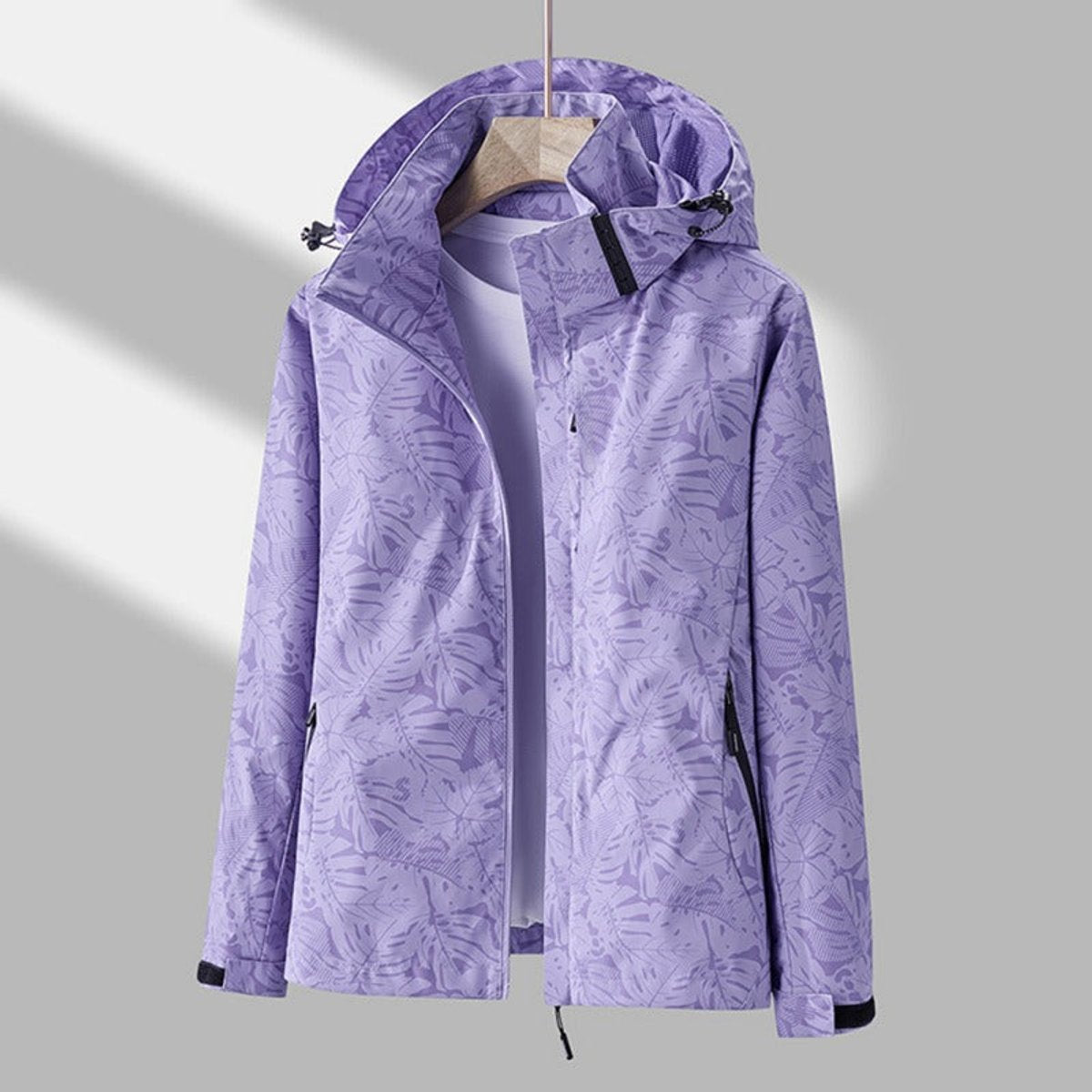Veste légère imperméable et coupe-vent à capuche pour femme