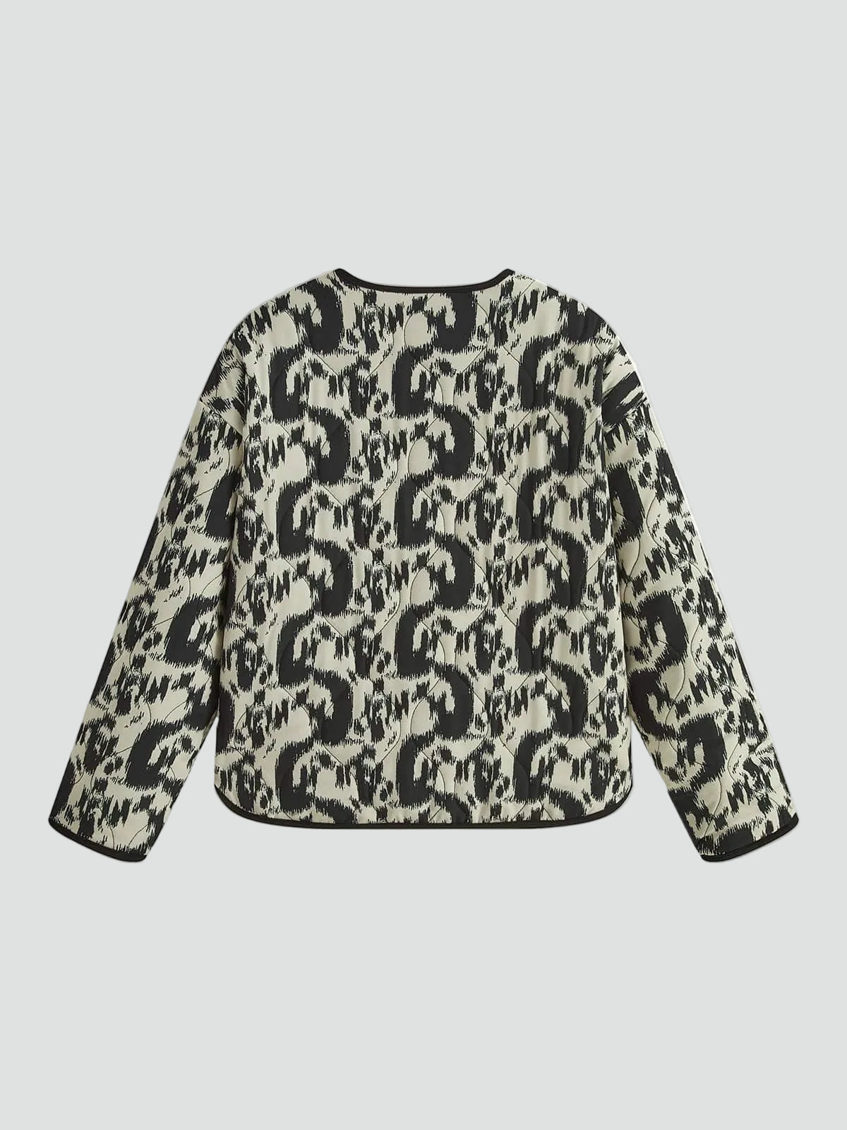 Women's black and white abstract animal print quilted collarless jacket