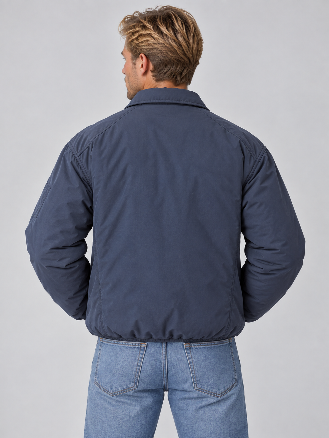 Men's padded collared bomber jacket with zip front and angled pockets
