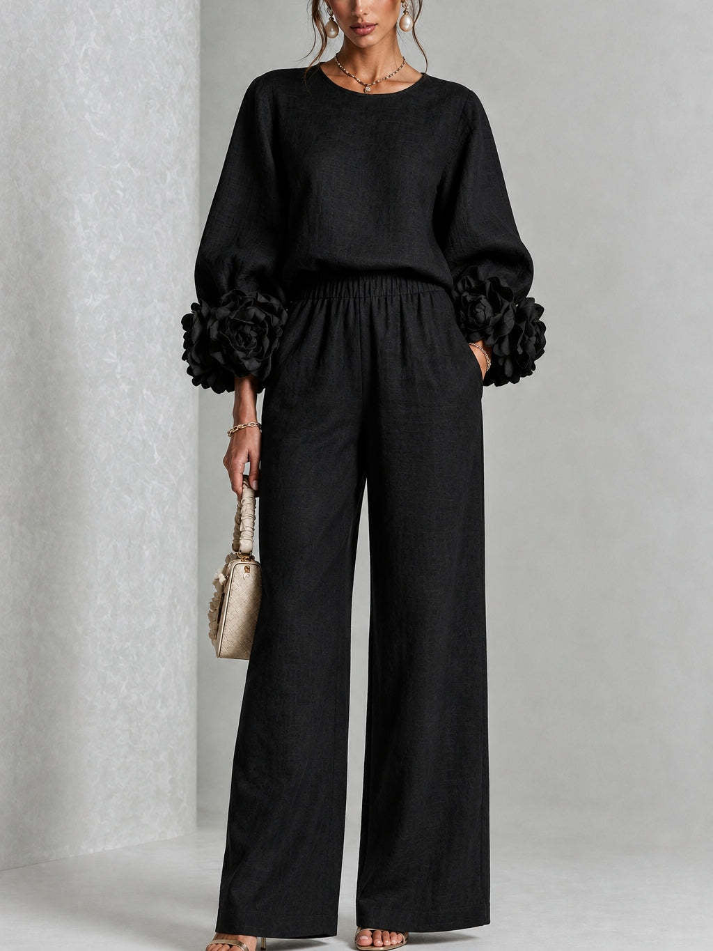 Women's two-piece set with round-neck top, rosette cuffs and wide-leg trousers