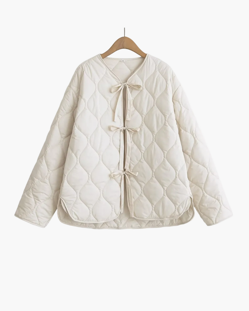 Women's quilted tie front jacket with diamond quilting and long sleeves
