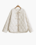 Women's quilted tie front jacket with diamond quilting and long sleeves