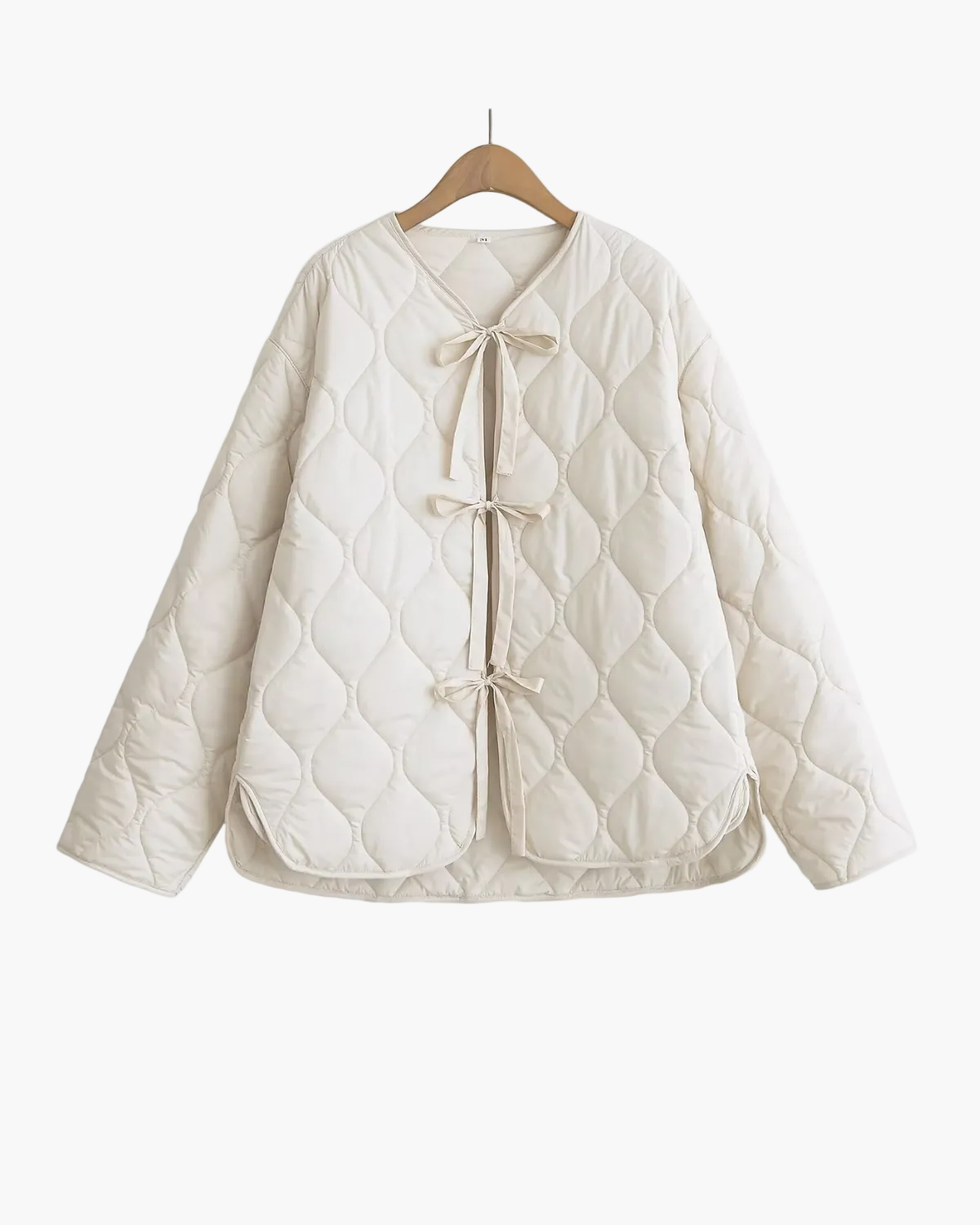 Women's quilted tie front jacket with diamond quilting and long sleeves