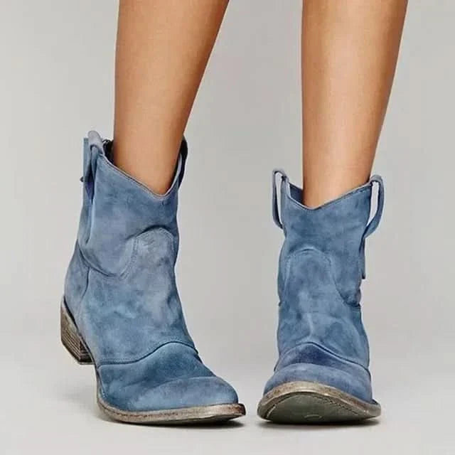 Women's vintage western ankle boots with pointed toes, pull tabs and low stacked heels