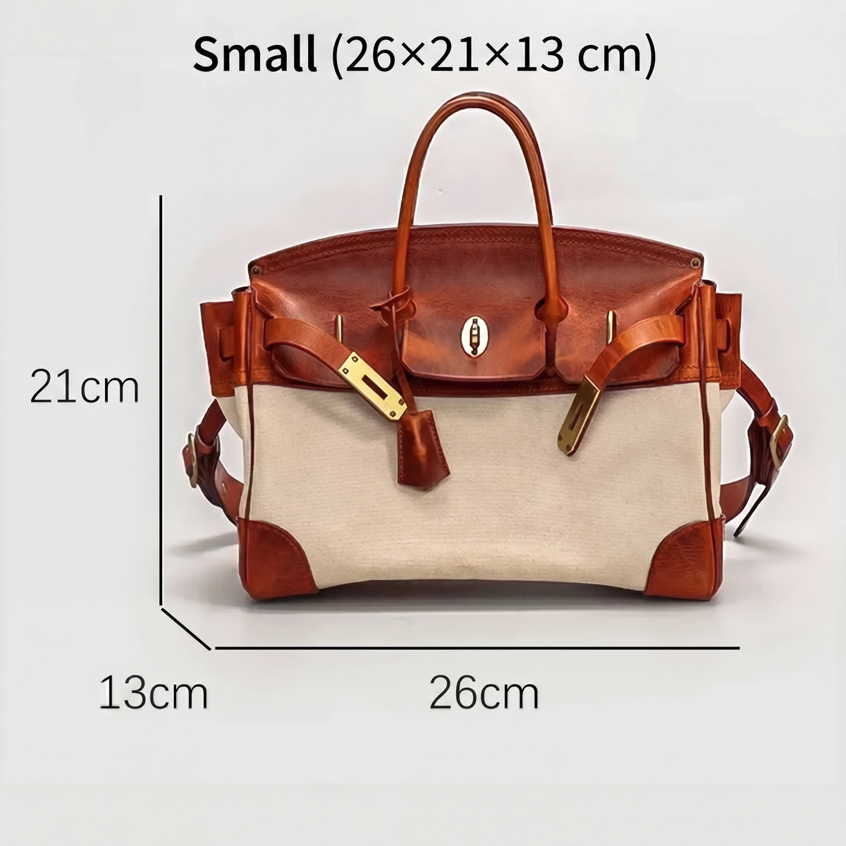 Women's two-tone brown and cream structured top handle bag with turn-lock flap