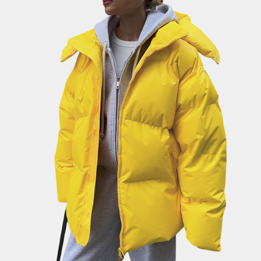 Women's oversized quilted puffer jacket with hooded collar and zip front